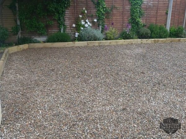 Gravel being laid on a driveway in Rhode